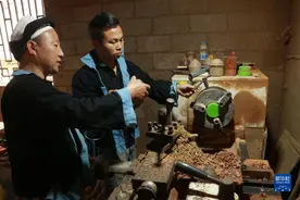 奋进新征程 建功新时代·伟大变革丨“陀螺王”和大山的故事图片