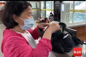 粗心旅客过安检丢了3.2万元现金 海口铁警物归原主图片