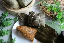 端午节温馨提示：吃一个粽子至少步行1小时图片