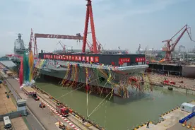 第三艘国产航母“福建舰”下水，相关A股航母概念股午后冲高图片