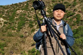 拍长城的摄影师：长城是一部大书，有高潮情节，也有一般段落图片