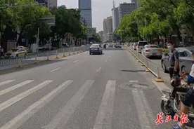 闹市这个路口为什么总堵车？市民开出“药方”，交管部门采纳了图片