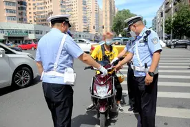 哈尔滨开展路口交通违法整治 处罚非机动车违法380余件图片