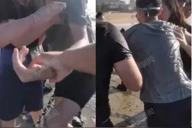 烟台两男孩海边玩耍被浪冲远，3男子用皮带将二人拉回岸边图片