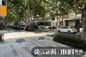 记者帮 | 杭州青年路隔离石墩老绊倒人？上午又有老人中招！刚刚，石墩开始拆除图片