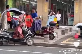 浙江一对男女疑因随地扔纸与环卫工起冲突，警方：正在处理图片