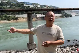 小孩被困金沙江，货车司机趟水救援被划伤：为人父母，不能见死不救图片