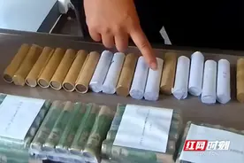 长沙一女子遭无理辞退 公司赔偿122斤硬币 法院：罚图片