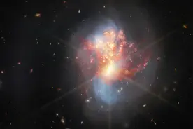 韦伯望远镜拍下距地球2.7亿光年外两星系碰撞新图像图片