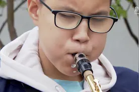 自强不息！14岁“微光男孩”萨克斯过10级并自学谱曲图片