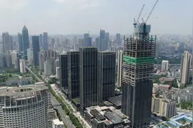 330米解放大道第一高楼封顶！汉口精武路改造迎来全面收官图片