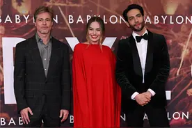 《巴比伦》伦敦首映 玛格特·罗比一抹红裙秀美背图片