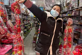 可循环利用还可当挂件 电子鞭炮成青岛市民留年味新宠儿图片