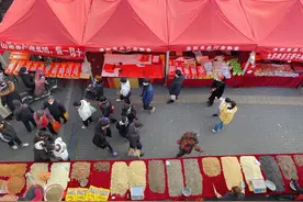 故乡年味·图集｜逛洛阳老城区年会，尝牡丹鲜花饼和银丝酥图片
