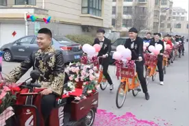 【原创】骑着自行车来接亲 低碳环保又热闹图片