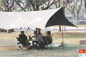 公园“露营热” 搭帐篷需“防绊”图片