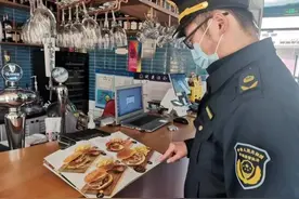 “大胃王挑战”涉嫌违法，西餐厅推出1公斤汉堡1小时内吃完免单活动被罚图片