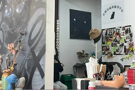 武汉小动物保护协会开了家黑猫猫咖，协会会长：中华田园猫完全不比外国品种猫差图片