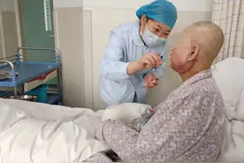 57岁女子牙龈上长了颗“花生米”，一查竟是癌图片