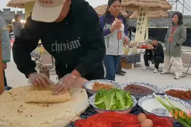 果然视频|煎饼“卷”起来了，看台儿庄古城的煎饼文化节图片