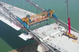 探访伶仃洋大桥合龙现场——世界海中最高猫道上，湖北建设者稳稳走“钢丝”图片