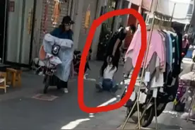 男子扯女子头发当街拖行并殴打，警方将其拘留，目击者：疑是他对女子试衣服不满图片