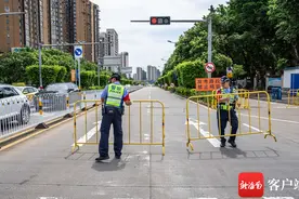 原创组图 | 2023高考英语科目开考 海口考场周边进入“静音”模式图片