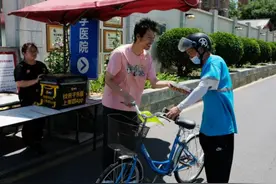 外卖“电驴”禁入社区 这个街道设“小哥单车”解决送餐难题图片