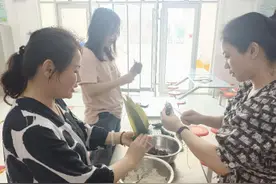 粽香沁童心——东昌府区启明小学开展包粽子实践体验活动图片