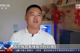 “超人”大哥徒手爬窗救人图片