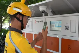 闵行铁塔243个换电柜上岗，1分钟为快递、外卖小哥“加满油”图片