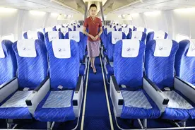 国际航班经济舱要付费选座？记者调查→图片