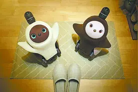 日本流行宠物机器人陪伴生活图片