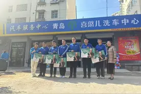 岛城首家“喜憨儿”洗车中心1岁啦！青岛春雨残疾人辅助就业中心为特殊群体点亮希望之光图片