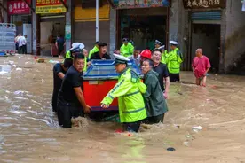三评汛情|暴雨中，每一个你都要紧图片