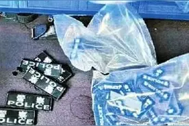 自制警用装备并销售，违法！图片