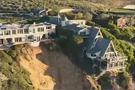 美国加州暴风雨引发山体滑坡 悬崖顶部豪宅岌岌可危图片