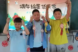 端午晒习俗|彩线编成兜，装上鸡蛋来比拼，这个端午习俗你家有吗？图片