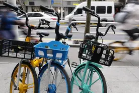 上海街头有“亲子共享单车”亮相？注意！骑车带人得符合这些条件图片