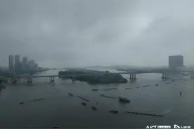 龙舟水里看龙船，雨中车陂景、员村景，见水墨画般的城市背景图片