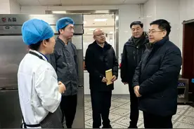 张旭晨慰问局机关后勤服务一线干部职工图片