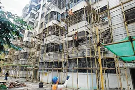 海口一塔吊折断砸向相邻小区致楼房墙体开裂！后续维修和赔偿如何处理？图片