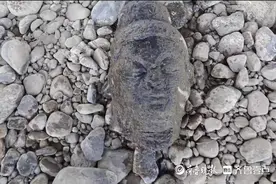 龙门石窟旁钓鱼“钓”到佛头，研究院：正在鉴定，并非首次发现图片