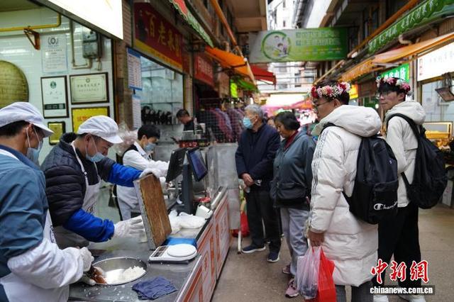 农贸市场里感受“有一种叫云南的生活”