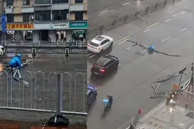 外卖小哥顶风雨独自清理道路路障被爆赞，目击者：我还在犹豫他已经停车了图片