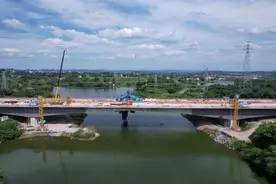 团结水库二桥实现全桥合龙 预计九月底建成通车图片