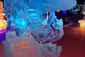哈尔滨巨龙冰雕被掰掉牙齿，景区：不会追究，本就是消失的艺术图片