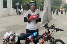 贵州小伙骑行900公里上武大图片