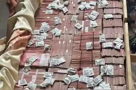 近2000万元现金藏床板下！警方公布图片