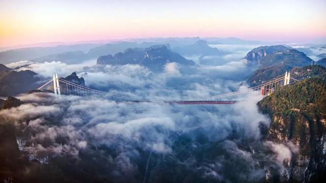 名场面！云海“漫”过矮寨 崀山“浮”于云端……